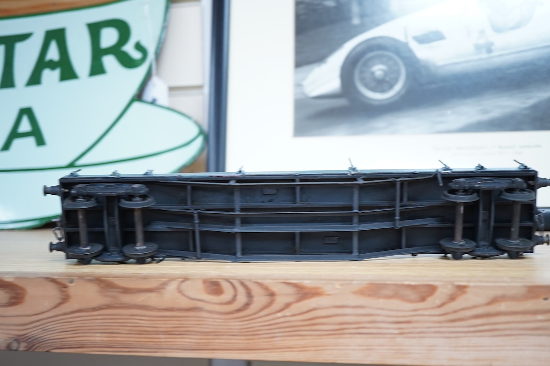 Eleven 0 gauge model railway items including; a bogie stake wagon, two mineral wagons, a North British coal wagon and two further open wagons, a partly constructed brake van, together with a Lima LMS 4F locomotive, two L
